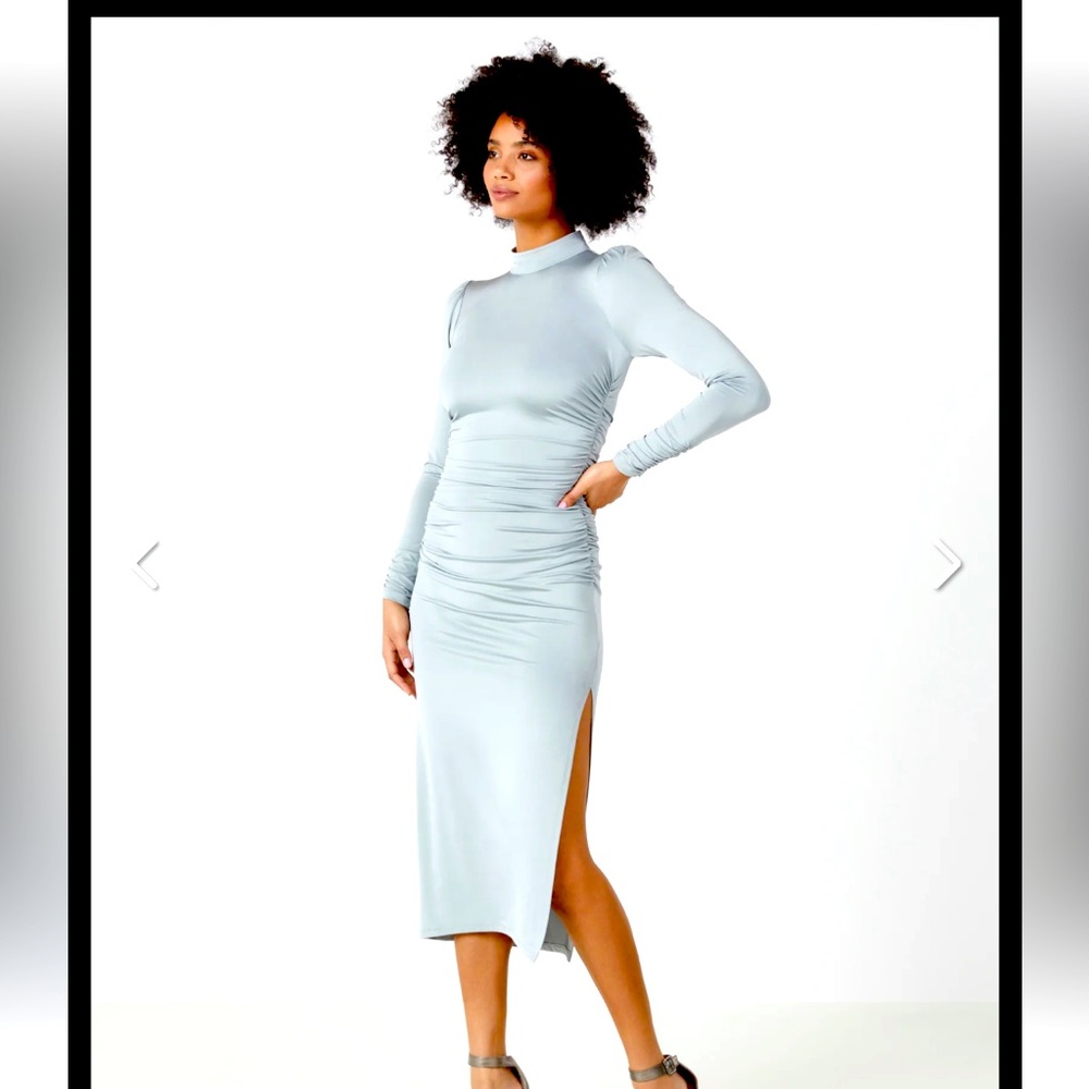 New tags on ! BCBG long sleeve cocktail dress .